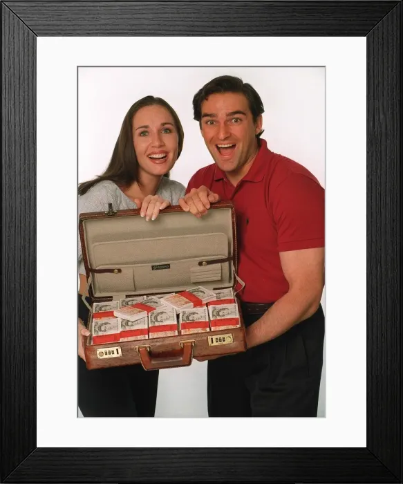 Framed Print : Couple with Suitcase of Money - Daily Mirror Promotion