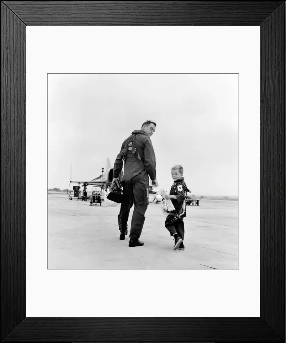 Framed Print : Lieutenant Commander Peter Marshall of the Fleet Air arm with his four year old son Framed Print : Lieutenant Commander Peter Marshall of the Fleet Air arm with his four year old son