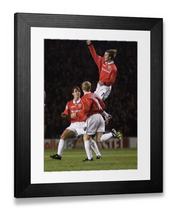 Framed Print : Football - Manchester Uniteds David Beckham celebrates scoring the first goal with