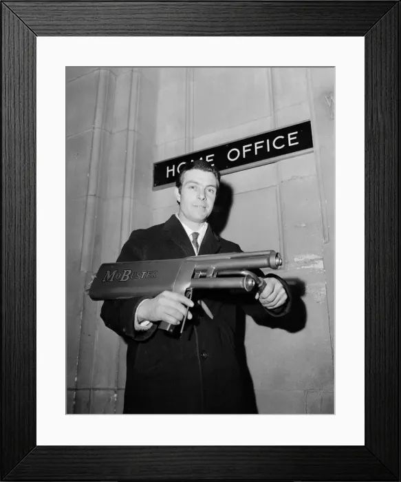 Framed Print : New anti riot gun January 1969 1960s Mobuster Weapon, Home Office Framed Print : New anti riot gun January 1969 1960s Mobuster Weapon, Home Office