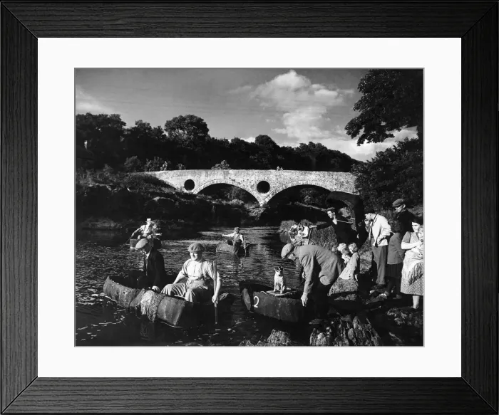 Framed Print : By the famous Cenarth bridge the coracle fishers set out for a days fishing