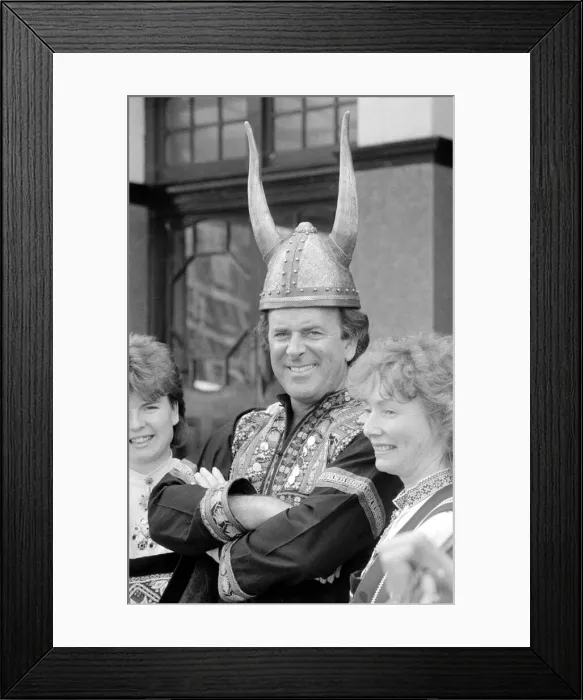 Framed Print : BBC television chat show host Terry Wogan wearing a Viking helmet May 1986 Framed Print : BBC television chat show host Terry Wogan wearing a Viking helmet May 1986