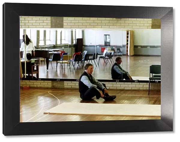 Bruce Forsyth Comedian and TV Presenter exercising in gymnasium