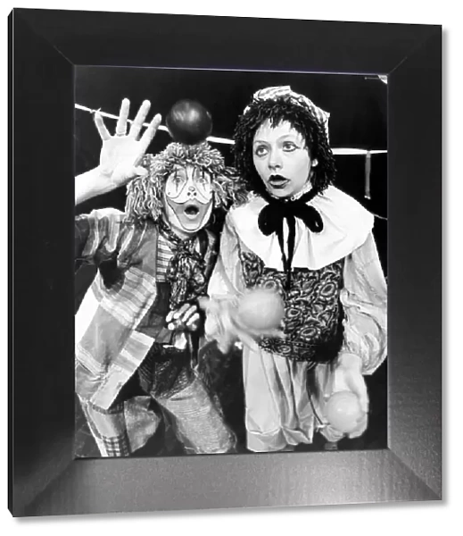 Two circus clowns juggling balls. 14th July 1979