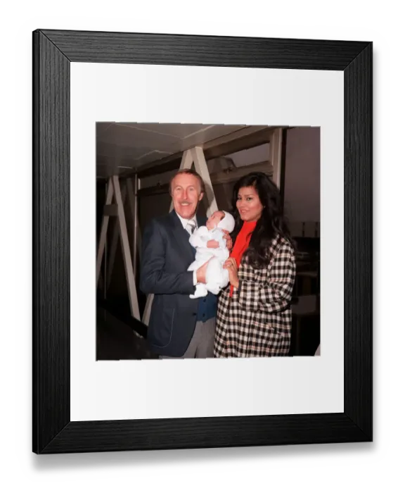Framed Print : TV Presenter Bruce Forsyth December 1986 with his wife