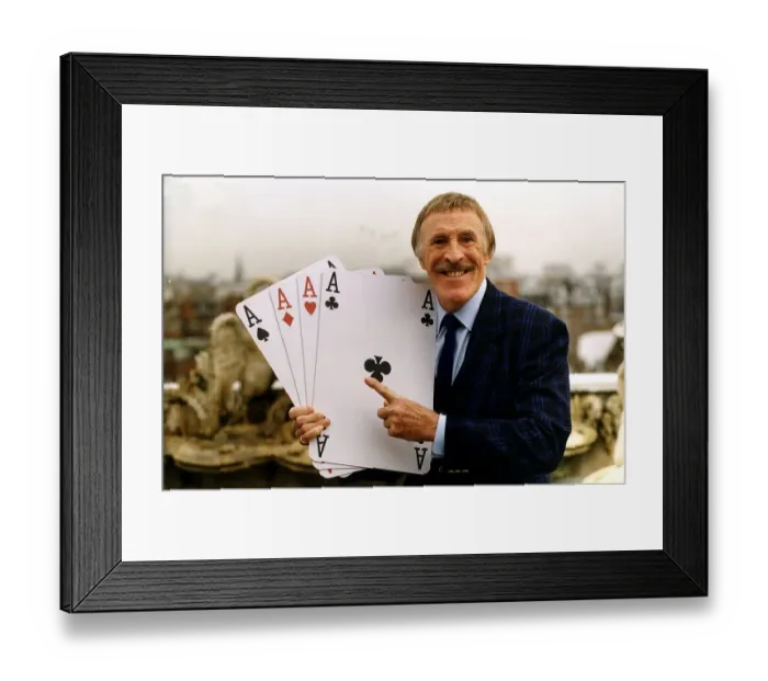 Framed Print : Bruce Forsyth TV Presenter Holding playing cards which are used on his hit tv show Play