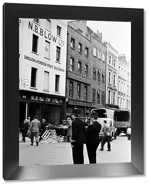 Scenes at Covent Garden, central London on the corner of Wellington Street with two