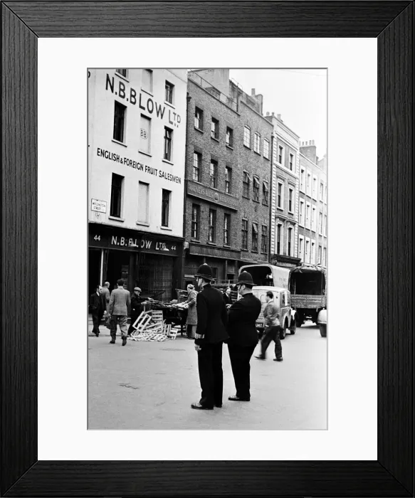 Framed Print : Scenes at Covent Garden, central London on the corner of Wellington Street with two Framed Print : Scenes at Covent Garden, central London on the corner of Wellington Street with two