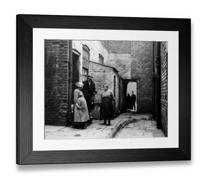 Framed Print : The occupiers of No 3 Court, Clayton Street, Liverpool, with their canary. 2nd March 1933 Framed Print : The occupiers of No 3 Court, Clayton Street, Liverpool, with their canary. 2nd March 1933
