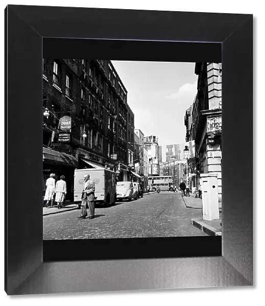 Scene in Old Compton Street in Soho, London. Circa 1955