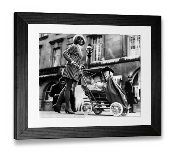 Framed Print : Model Susie Bell, age 27 of Putney, demonstrates the new baby-tendem on 30th September
