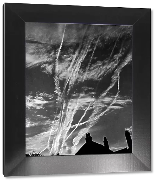 Vapour trails over London as planes speed to Normandy, Northern France during the Second
