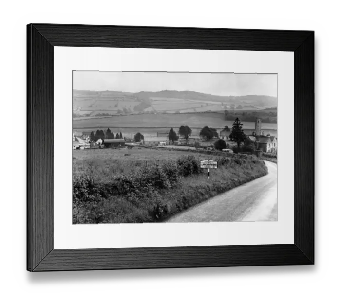 Framed Print : View of the village of Llangendeirne in the River Gwendraeth river valley