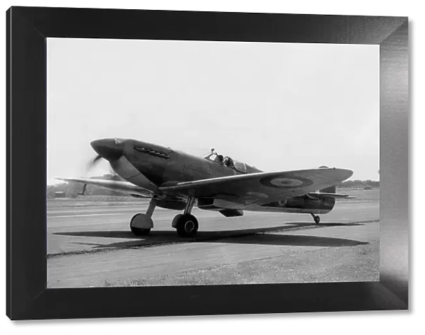 A Spitfire fighter plane arrives at RAF Usworth Airport