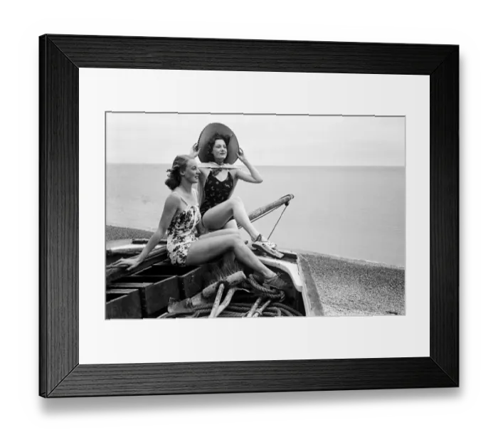 Framed Print : Women in their bathing costumes in a fishing boat along the coast, Hastings, circa 1945 Framed Print : Women in their bathing costumes in a fishing boat along the coast, Hastings, circa 1945