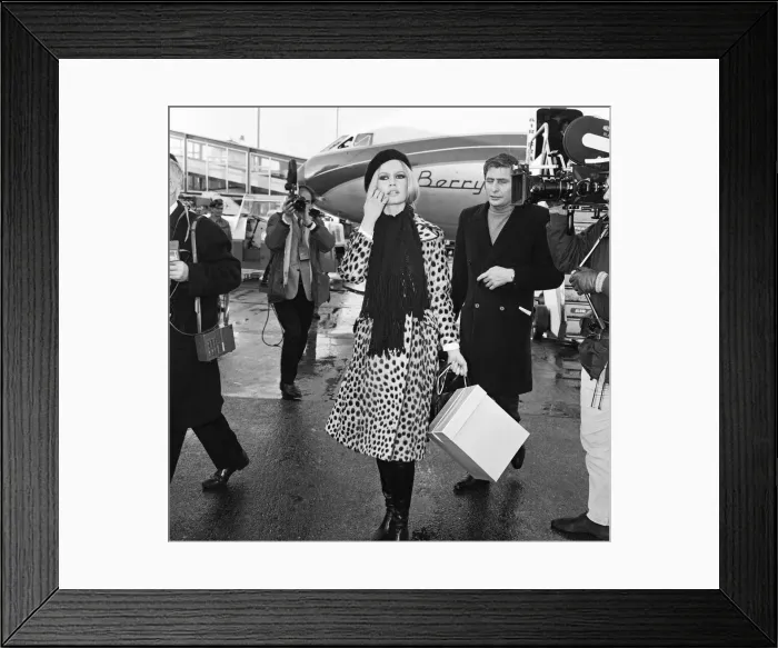 Framed Print : French film actress Brigitte Bardot arriving at London
