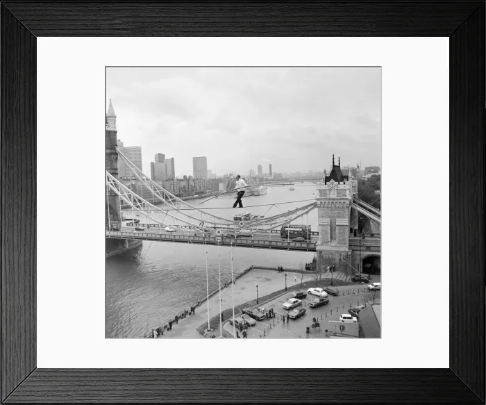 Framed Print : Karl Wallenda, Tightrope Walker, crosses 100ft above the ground, near Tower Bridge Framed Print : Karl Wallenda, Tightrope Walker, crosses 100ft above the ground, near Tower Bridge