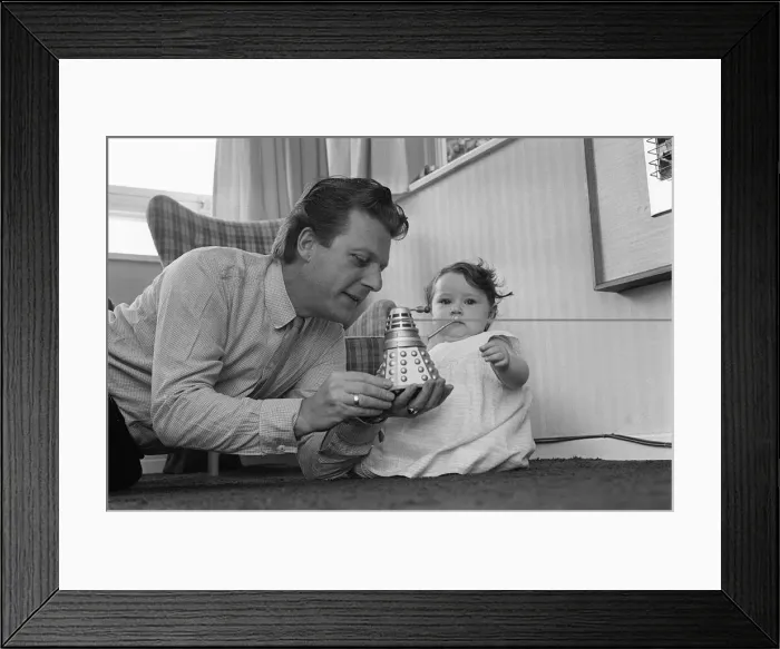 Framed Print : Raymond Cusick designer of the Daleks from Doctor Who 1965 playing with his