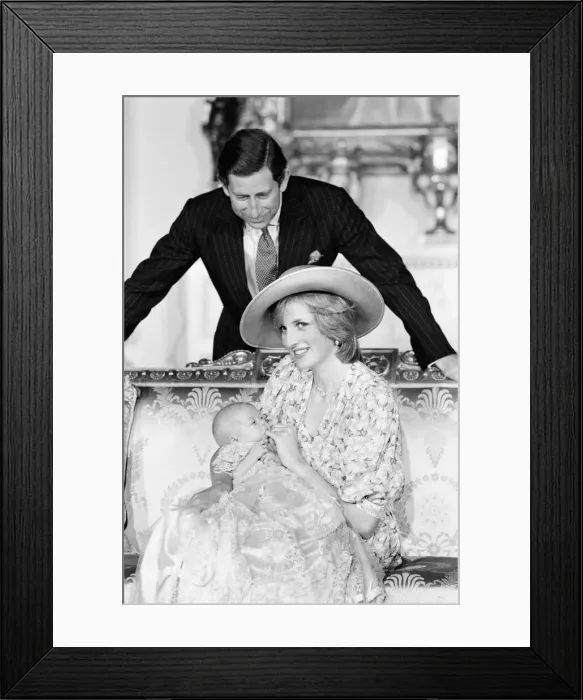 Framed Print : Princess Diana, watched by husband prince Charles, holds her son Prince William in her