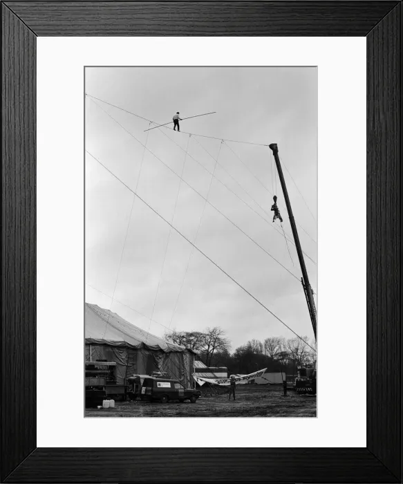 Framed Print : Karl Wallenda, Tightrope Walker, crosses over Europes largest circus tent wire Framed Print : Karl Wallenda, Tightrope Walker, crosses over Europes largest circus tent wire