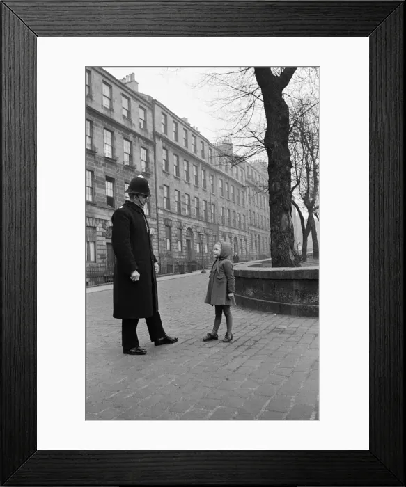 Framed Print : A policeman talking to a small girl, Edinburgh, 1945 Framed Print : A policeman talking to a small girl, Edinburgh, 1945