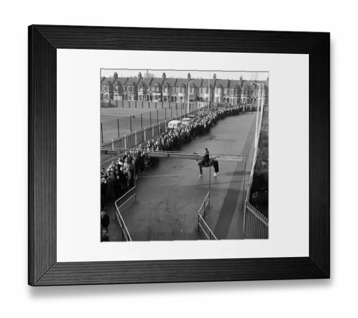 Framed Print : West Ham v. Burnley Cup Tie ticket queue at Upton Park. 27th february 1964 Framed Print : West Ham v. Burnley Cup Tie ticket queue at Upton Park. 27th february 1964