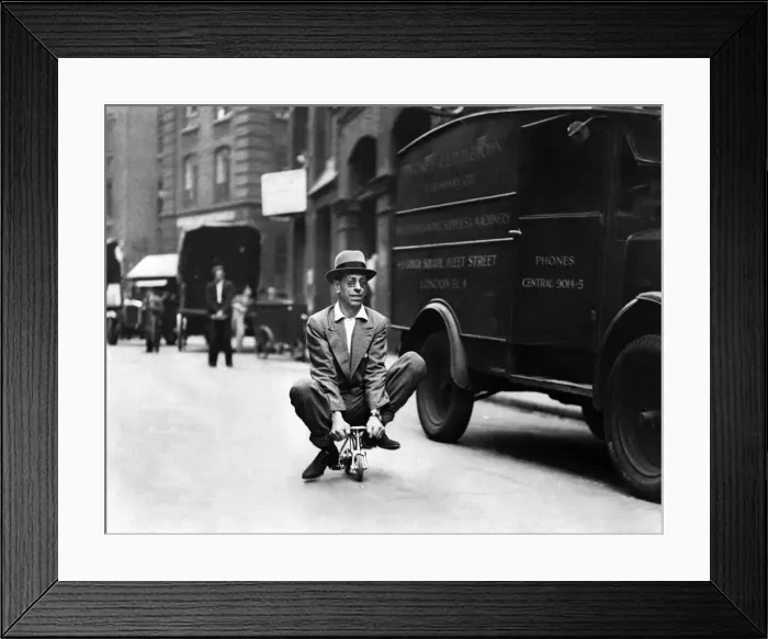 Framed Print : Transport cycle: Smallest cycle in the city in a tabb a motor