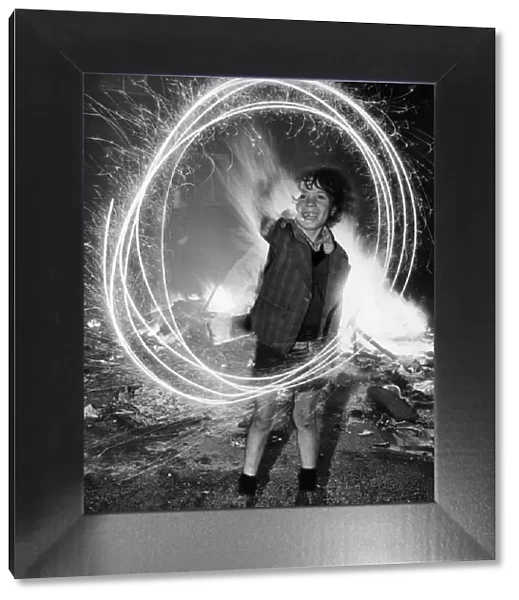 The traditional sparkler still holds plenty of magic for eight year old Terry Gibaney of