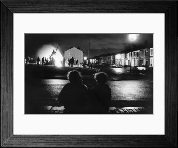 Framed Print : Residents of Hornby Boulevard, Bootle gather to watch a private bonfire Framed Print : Residents of Hornby Boulevard, Bootle gather to watch a private bonfire