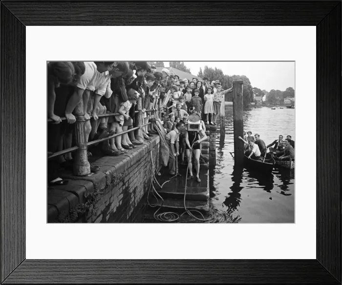 Framed Print : Testing out home made diving equipment, with crowds watching. Wiltshire. Circa 1945