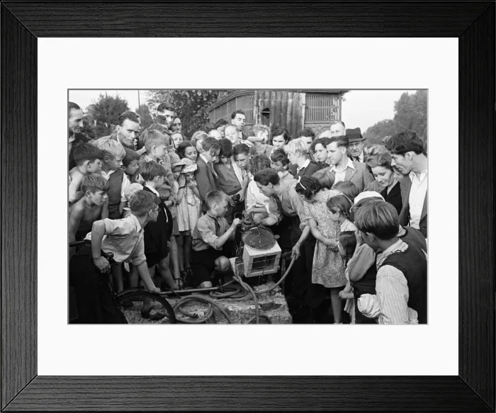 Framed Print : Testing out home made diving equipment, with crowds watching. Wiltshire. Circa 1945