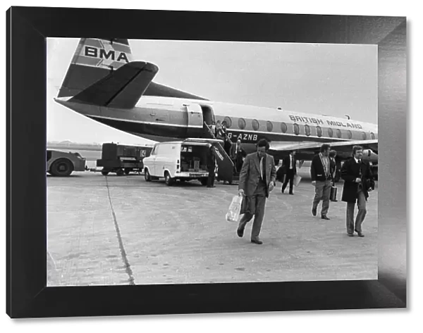 Passengers disembarking from a British Midlands Airlines Vickers Viscount aircraft at