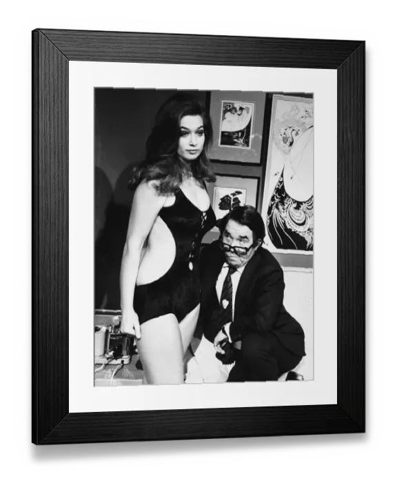 Framed Print : Actress Valerie Leon and Ronnie Corbett in a scene from the film No Sex Please We