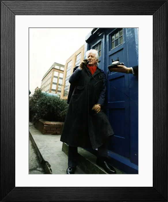 Framed Print : Jon Pertwee actor ex Dr Who leaning against police box like Tardis Glasgow talking Framed Print : Jon Pertwee actor ex Dr Who leaning against police box like Tardis Glasgow talking
