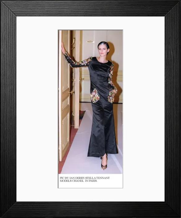 Framed Print : STELLA TENNANT models Chanel in Paris long black dress with coloured stones
