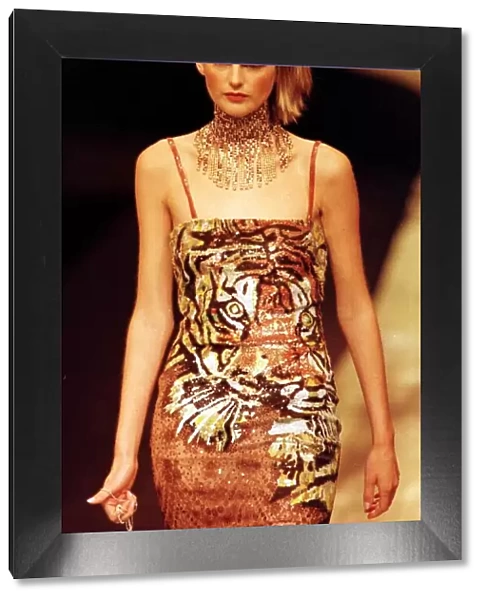 Stella Tennant models dress with tiger motif designed by Valentino at Paris Fashion Week