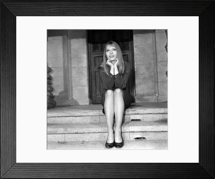 Framed Print : Mia Farrow actress in London April 1964 sitting on steps in front of doorway Framed Print : Mia Farrow actress in London April 1964 sitting on steps in front of doorway