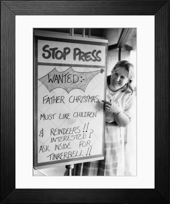 Framed Print : Shirley Jeffrey from Lord Street Job Centre with the Santa wanted sign Framed Print : Shirley Jeffrey from Lord Street Job Centre with the Santa wanted sign