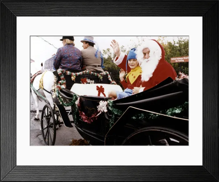 Framed Print : Father Christmas travelling in style with helper, six year old John Stubbs, of Billingham Framed Print : Father Christmas travelling in style with helper, six year old John Stubbs, of Billingham