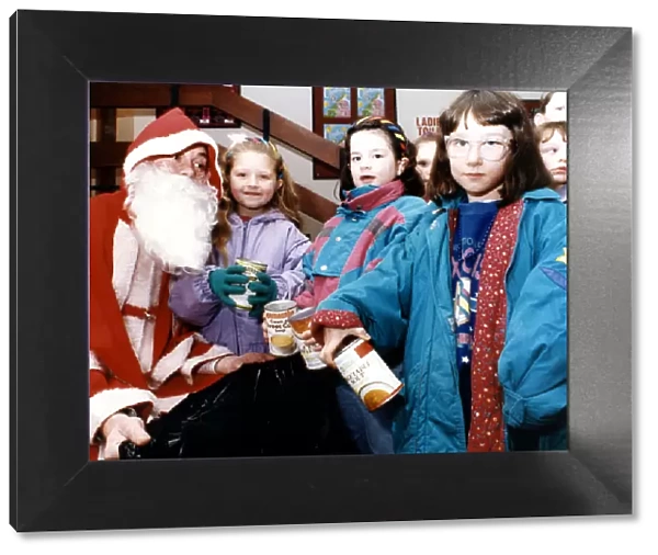 Children turned the tables on Santa at the Billingham Forum - taking gifts to him