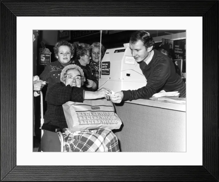 Framed Print : Gladys Davies, 73 from Wallasey, guided by her 10 year old grandson Michael