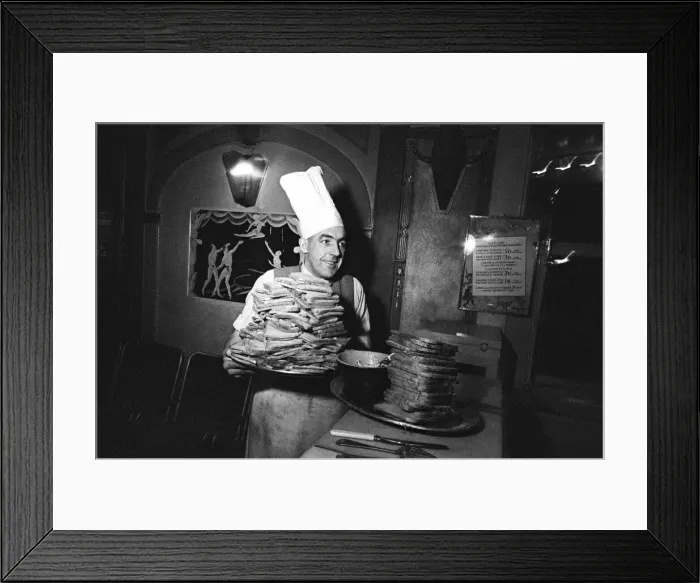 Framed Print : A chef with two huge piles of toast. April 1947 Framed Print : A chef with two huge piles of toast. April 1947