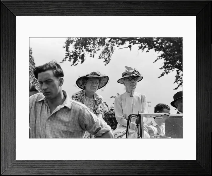 Framed Print : Two women watching an event during Canterbury Week, Kent, August 1947 Framed Print : Two women watching an event during Canterbury Week, Kent, August 1947