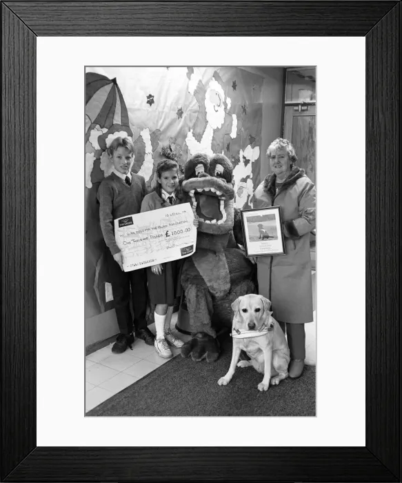 Framed Print : Wellhouse Middle School, Mirfield present a cheque to Guide Dogs for the Blind