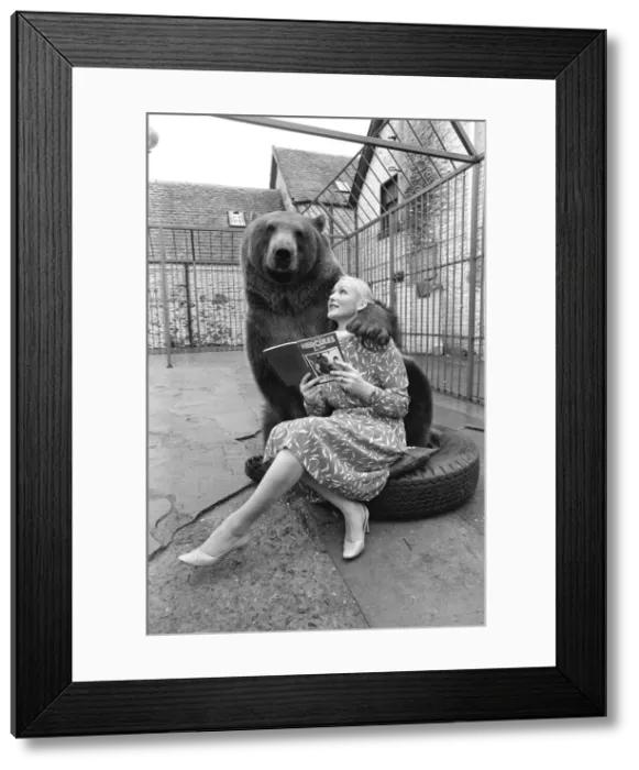 Framed Print : Hercules The Grizzly Bear, with owner Maggie Robin, who has recently written a book about Framed Print : Hercules The Grizzly Bear, with owner Maggie Robin, who has recently written a book about