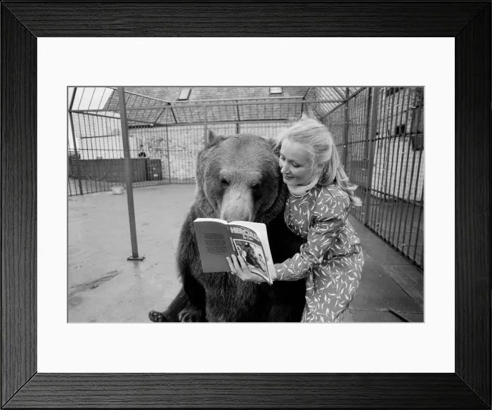 Framed Print : Hercules The Grizzly Bear, with owner Maggie Robin, who has recently written a book about