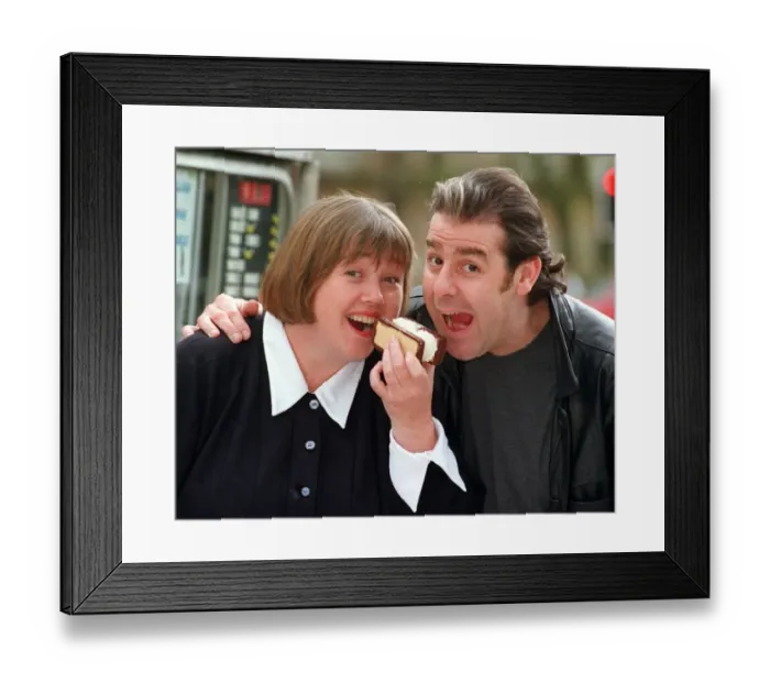 Framed Print : PAULINE QUIRKE AND ACTOR ANDY GRAY AT A BBC PHOTOCALL WITH A DOUBLE NOUGAT ICE CREAM