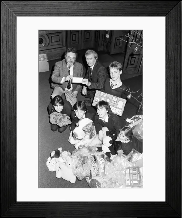 Framed Print : Royds Hall High School head Peter Clarkson presenting 40 cheque to NSPCC for their Framed Print : Royds Hall High School head Peter Clarkson presenting 40 cheque to NSPCC for their