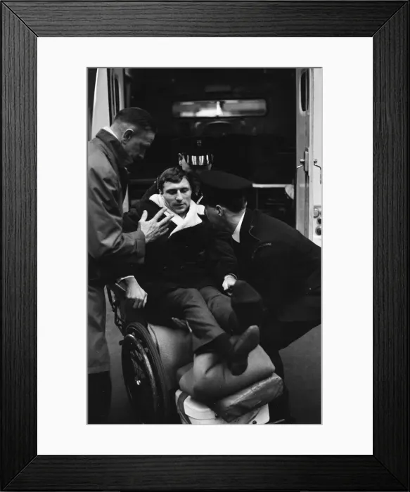 Framed Print : Charlton Athletic footballer Mike Bailey returns to London with his wife after breaking
