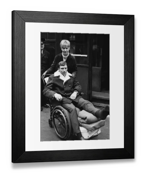 Framed Print : Charlton Athletic footballer Mike Bailey returns to London with his wife after breaking